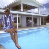 George Martin by the pool