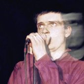 Ian Curtis on stage