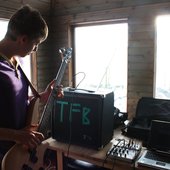 Luke recording a bass riff