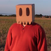 slow ufo with box on his head