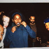 Thundercat on the far left, Kendrick Lamar in the blue hoodie