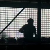 Behind the cage