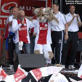 Joop Leeuwendaal (left) singing De Ajax Marsch