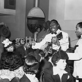Lonnie Johnson in south side of Chicago, IL, April 1941