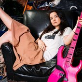 mitski and her pink bass