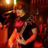 Justice Martinez as \"The Guitarist\"