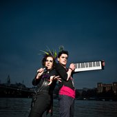 A promotional image from a photoshoot in London's South Bank on the banks of the Thames. Image by Rosie Collins at www.rosiecollinsphotography.com . Used in promotion of the show Frisky & Mannish's School of Pop.