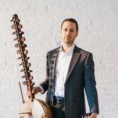 Kane Mathis holding his Kora