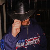 MOSSBACK in a hat