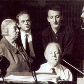 1962. John Gardner, Bronislava Nijinska, Malcolm Williamson, Richard Rodney Bennett and John Lanchbery. Edmund Rubbra is seated at the piano. 