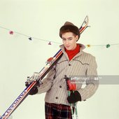 Posed studio portrait of Roddy Frame, ski 