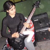 Kabe playing guitar
