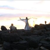 \"Summersolstace performance by lighthouse in Kópasker Iceland.\"