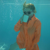 Alison Goldfrapp drinking tea underwater (2012)
