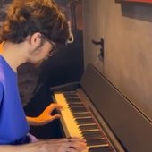 LoveSkars playing piano