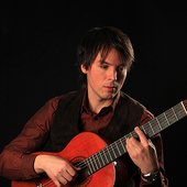 Playing guitar (taken from gitarrmusik.se)
