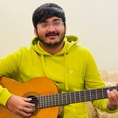 Swapnil Tiwari holding Guitar