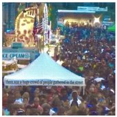 there was a huge crowd of people gathered in the street