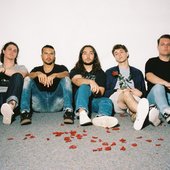 AT