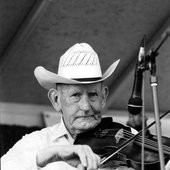 Kenny-Baker-photo-by-Scott-Elmquist-taken-at-Christopher-Run-Bluegrass-Fest-near-Mineral-VA-around-2000.jpg