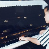 Qingqing-Ye-child-at-piano-3_LR-1280x620.jpg