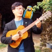 Gerald with Custard, the Macaw