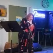 Grayson DeLong at an Open Mic in 2024