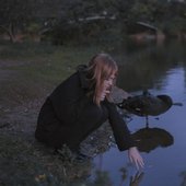 L'eau Sombre Reflétera Un Coucher De Soleil Orangé Spotfy cover