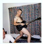 Jamie Stewart and Ches Smith by David Horvitz (from the book: \"Xiu Xiu, The Polaroid Project\")