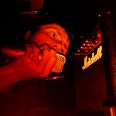 Lavair yelling at an amp