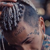 Koi tattoo on Toto Blu’s head..pisces 🤫
