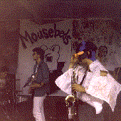 ring saxophonist wearing a map