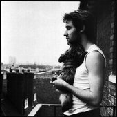 Jah Wobble with Mingus the Cat at Dellow House 1981