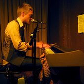 at the piano