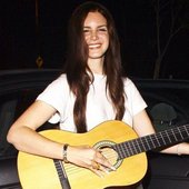 lana with a guitar