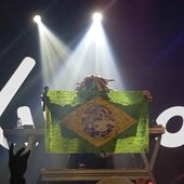 Kikuo holding Brazil flag