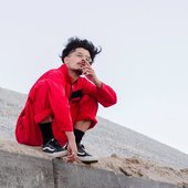 Sitting on a roof picking his nose kekw