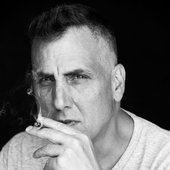 Mike Dean smoking a fat blunt - from his official website