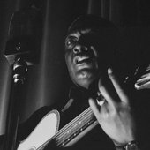 Face_detail,_(Portrait_of_Leadbelly,_National_Press_Club,_Washington,_D.C.,_between_1938_and_1948)_(LOC)_(4843137007)_(cropped)_(cropped).jpg