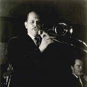BILL HARRIS Shown playing his trombone.jpg