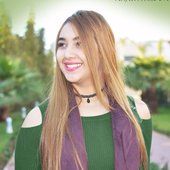 Najwa Farouk green top.jpg