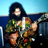 Yohann w. Bob Marley's guitar.JPG