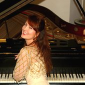 next to the piano