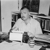 Ernest Hemingway at a typewriter. Finca Vigia, San Francisco de Paula, Cuba.jpg