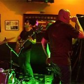 Photo taken at the Pot Belly bar by Patrick Cox.