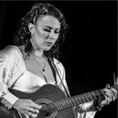 Playing guitar (black and white)