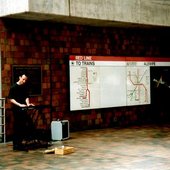 Playing keyboard in the Alewife train station 1994, where I developed most of my pieces for The Sound of Light CD. Photo by Michael Fischer