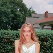 Emily-Krueger-Press-Shot-White-Dress-700x1036.jpg