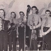 Dickie Jones (with fiddle) and band