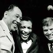  Duke Ellington and Sam Woodyard presenting the award "Danish Jazz Musician of the Year" to Alex Riel photo: Jan Persson